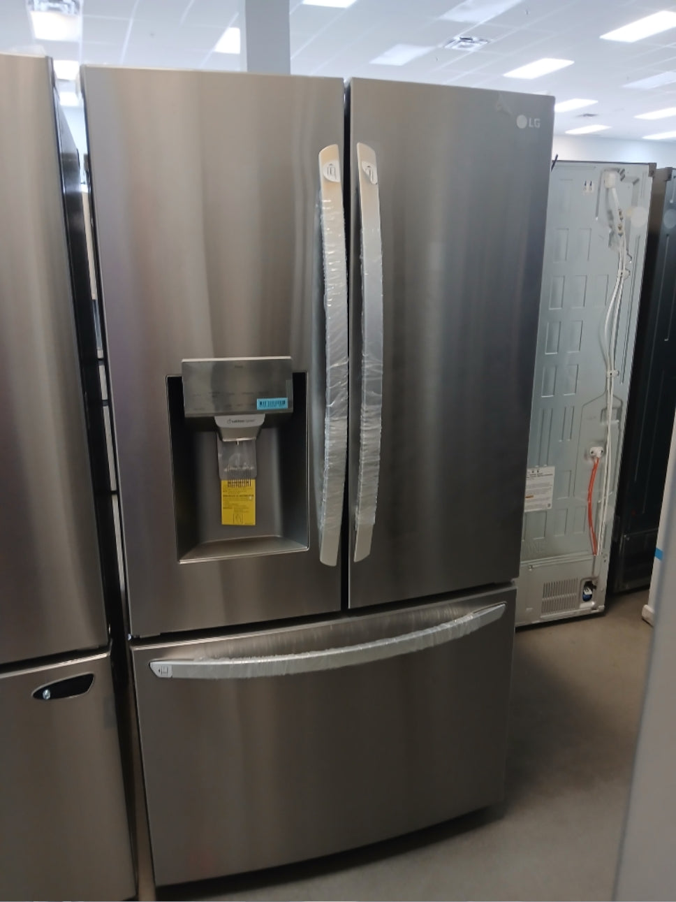 LRFS28XBS - REFRIGERATORS - LG - French 3-Door - Stainless Steel - Open Box